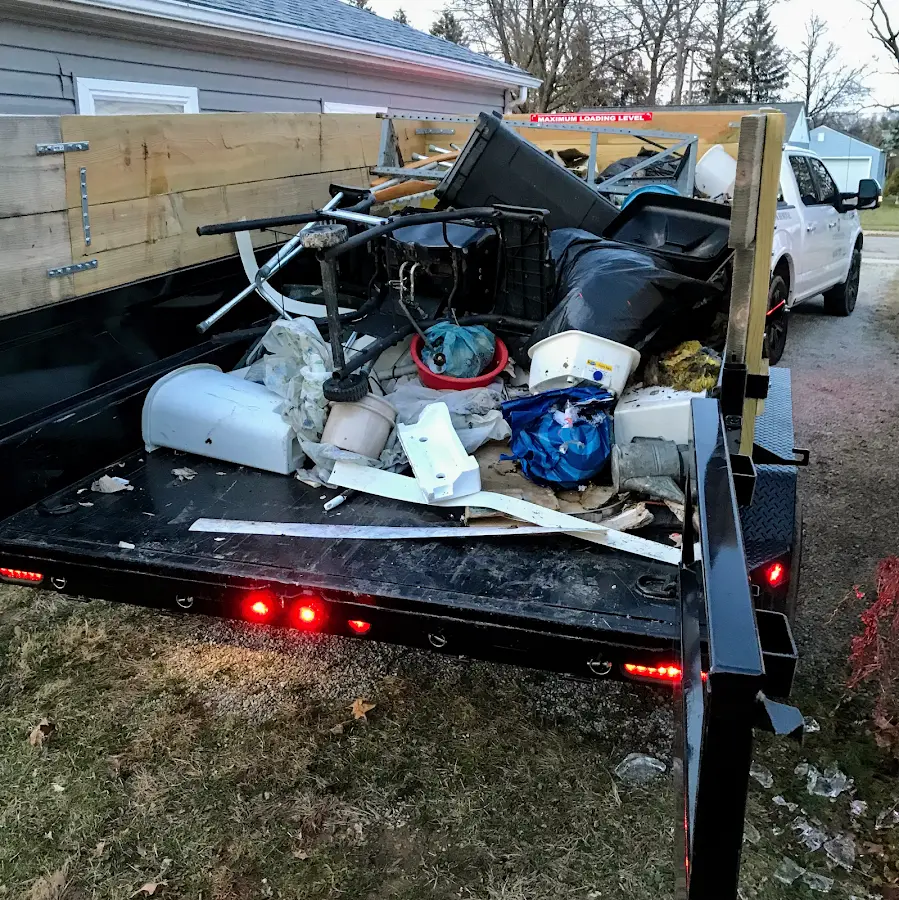 Roll-off dumpster delivered to a residential driveway in Barberton